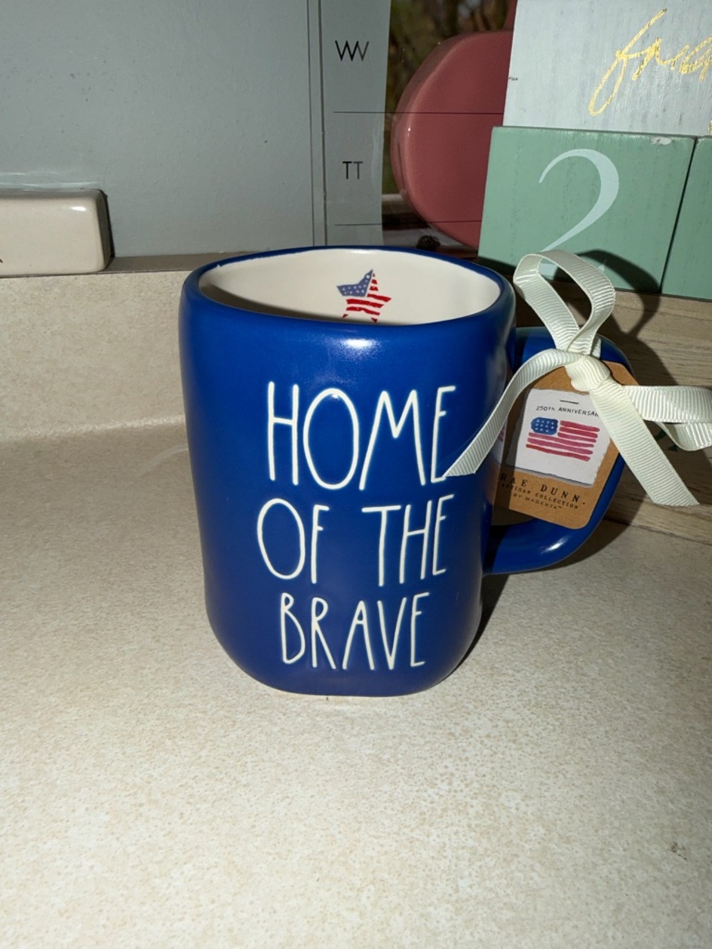 Rae dunn home of the brave mug